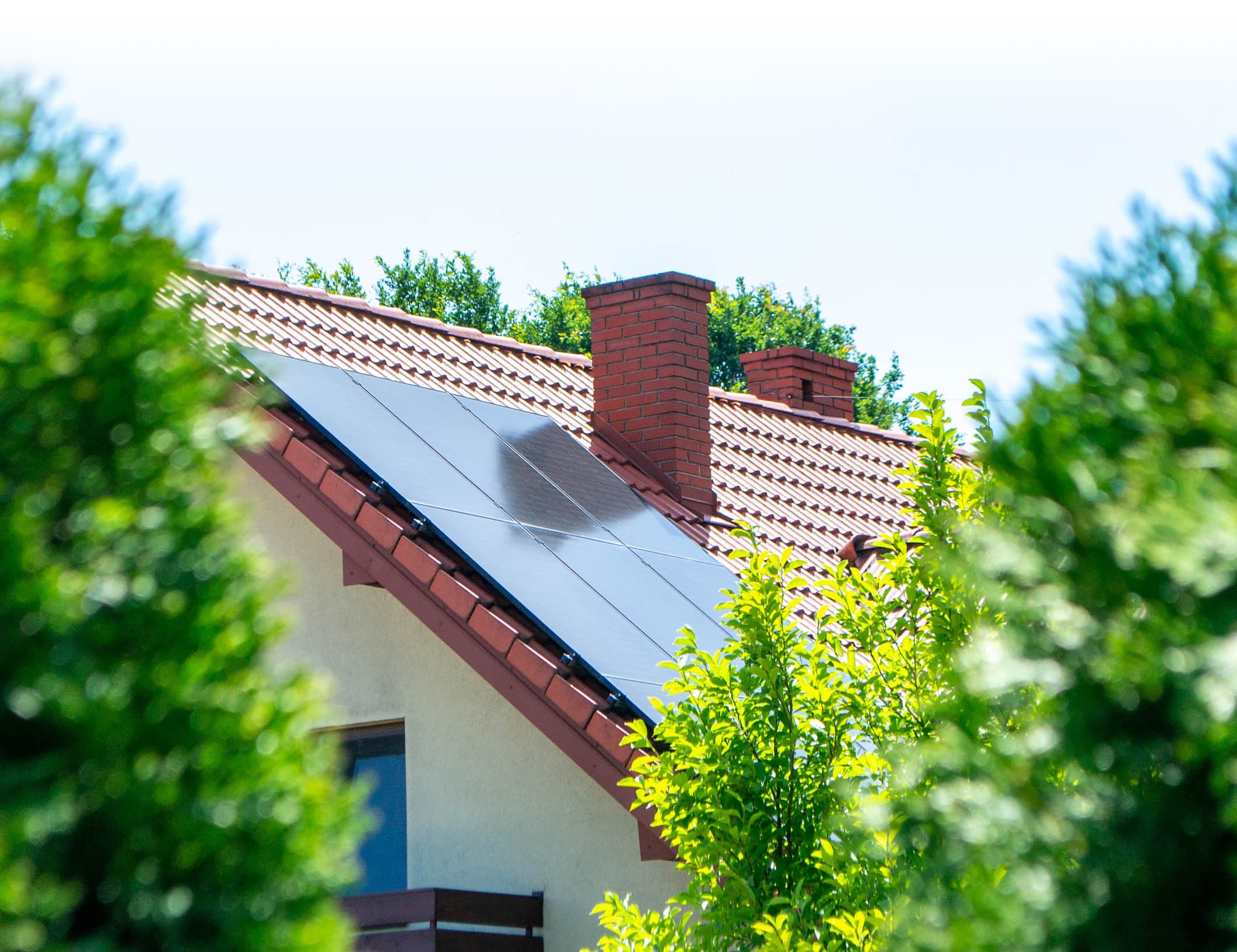Solar panels installed on residential roof to provide renewable energy